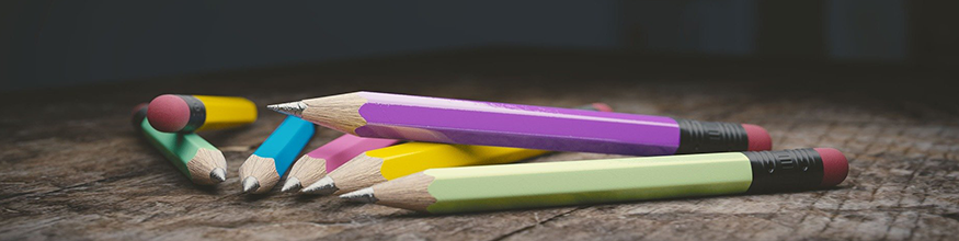 Sharpened pencils sitting on a table